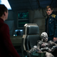 Jaylah gets comfortable in the Captain’s chair while Kirk (Chris Pine) watches.